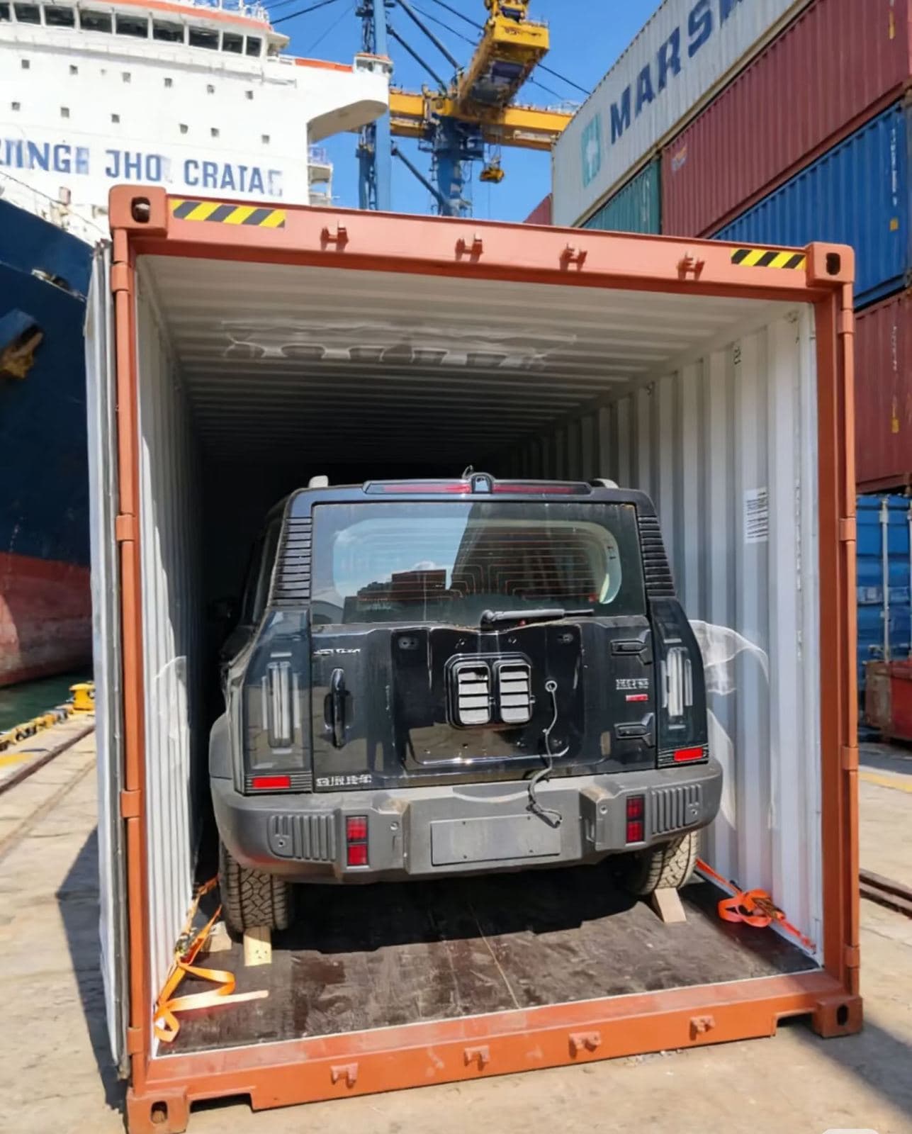 SUV secured in a container